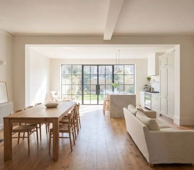 Open-plan kitchen and dining extension with bi-fold doors to garden