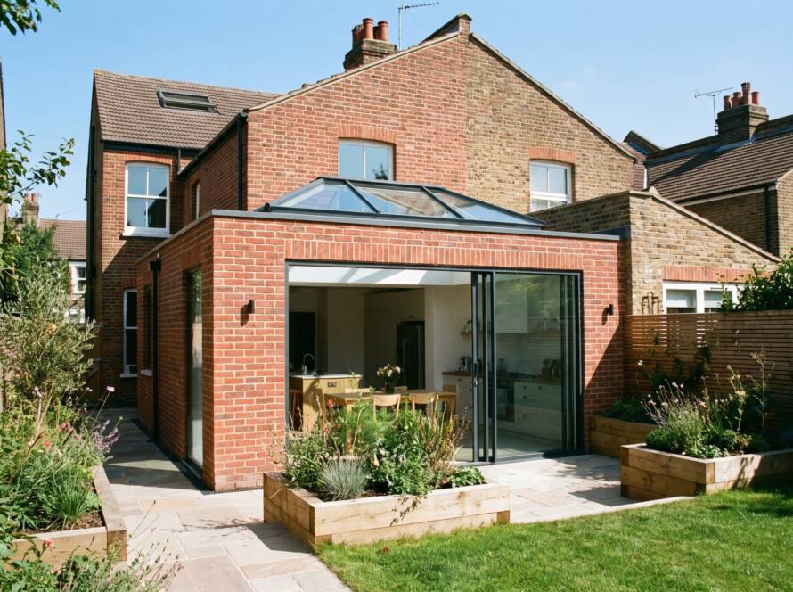 Brick house rear extension with glass roof lantern