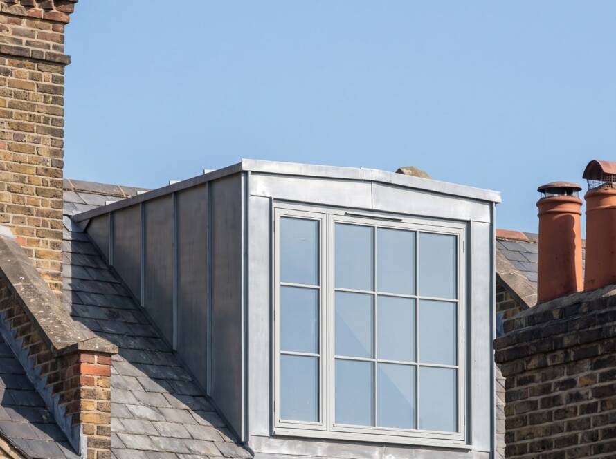 Rear dormer loft conversion exterior with slate roof